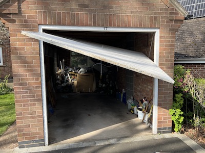 Broken Wonky Garage Door